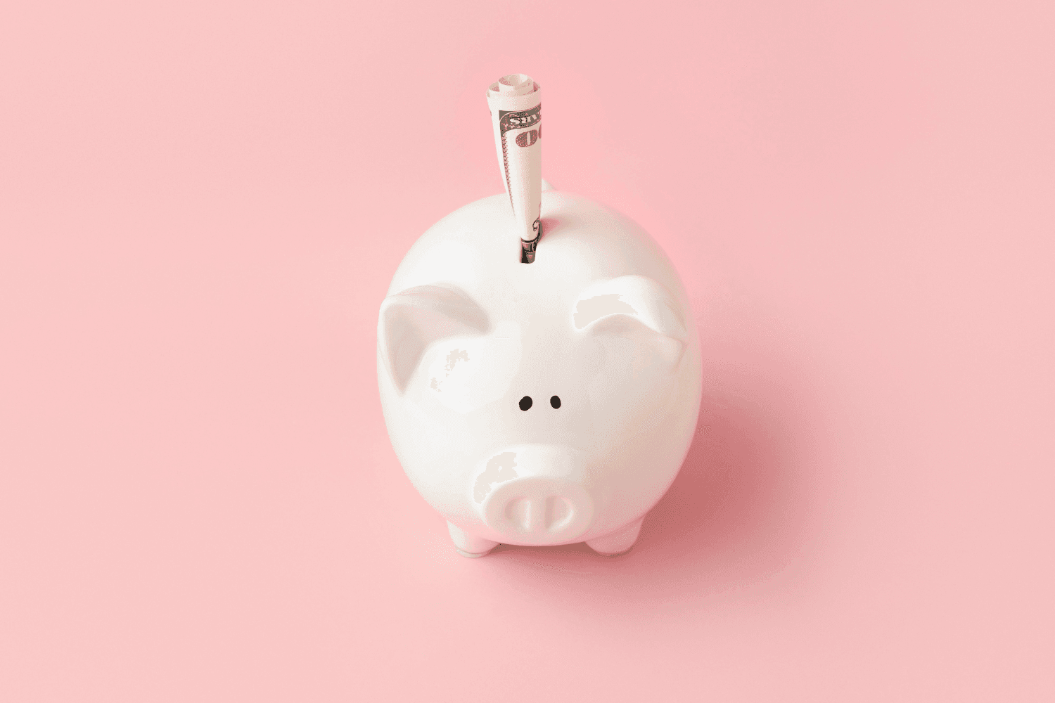 Cofrinho de porco simbolizando economia